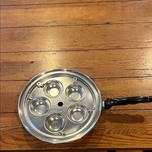 Stainless Steel Egg Poacher with lid. Heavy duty. Item is in very good condition